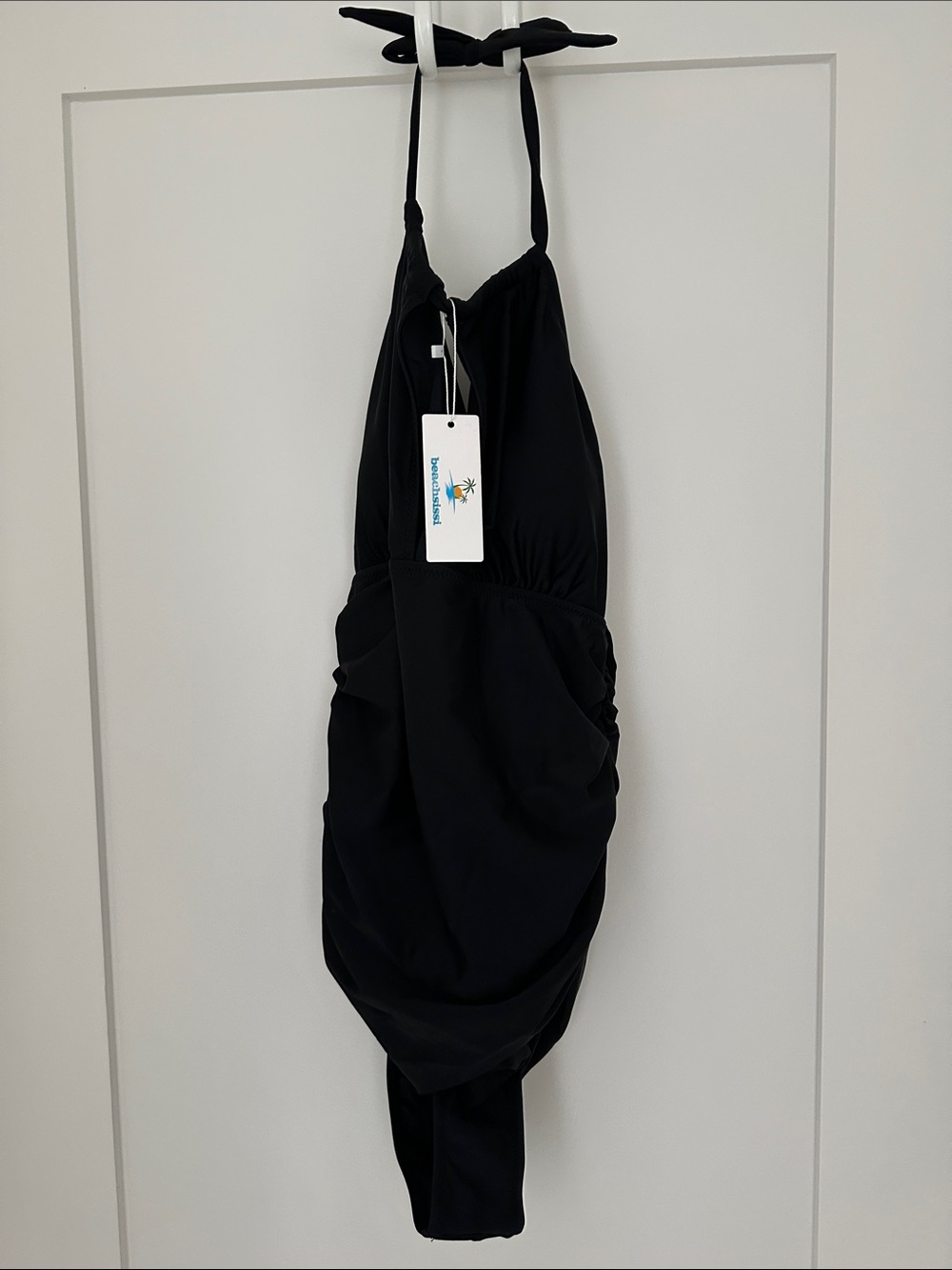 New with tags Black one piece swimsuit size XL.